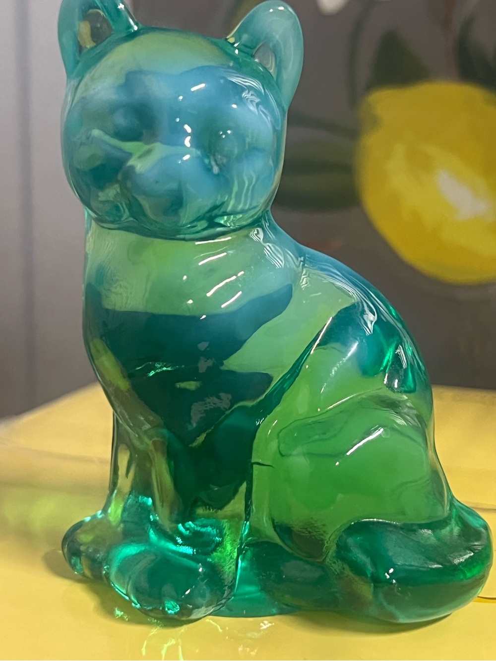 Fenton Art Glass blue and green opalescent sitting cat figurine.